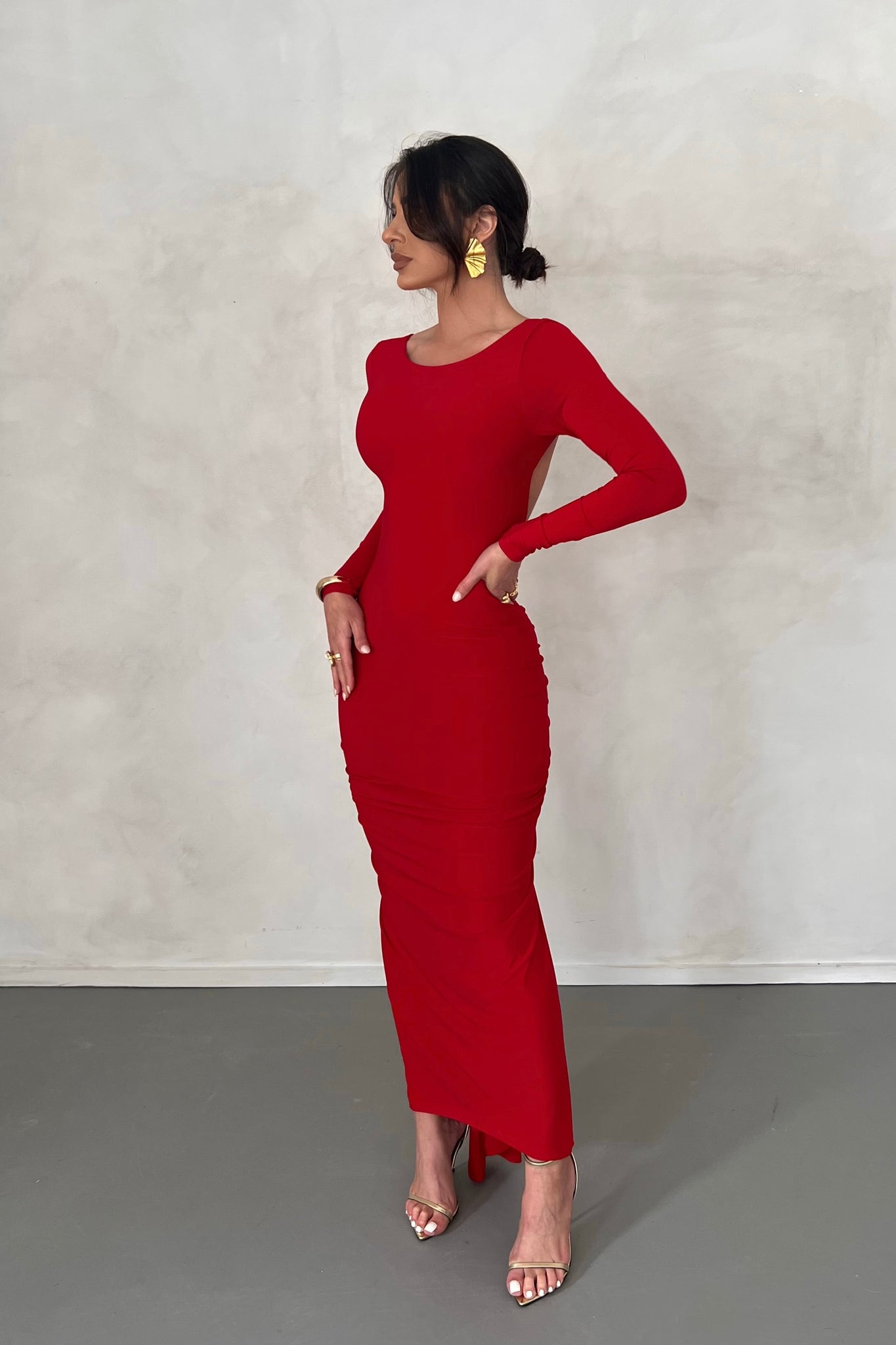 Red long hot sale sleeve backless dress