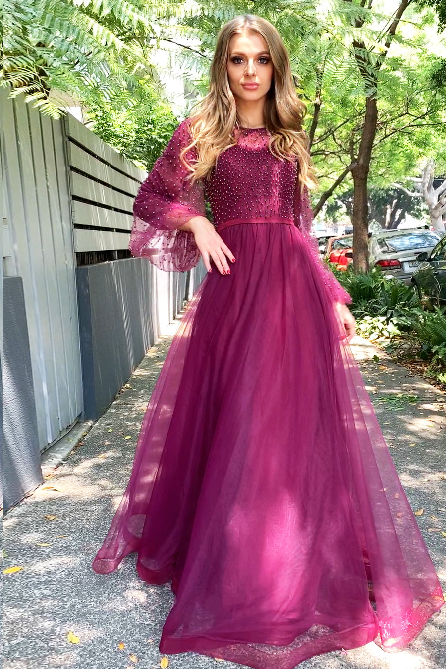 Plum gown with clearance sleeves