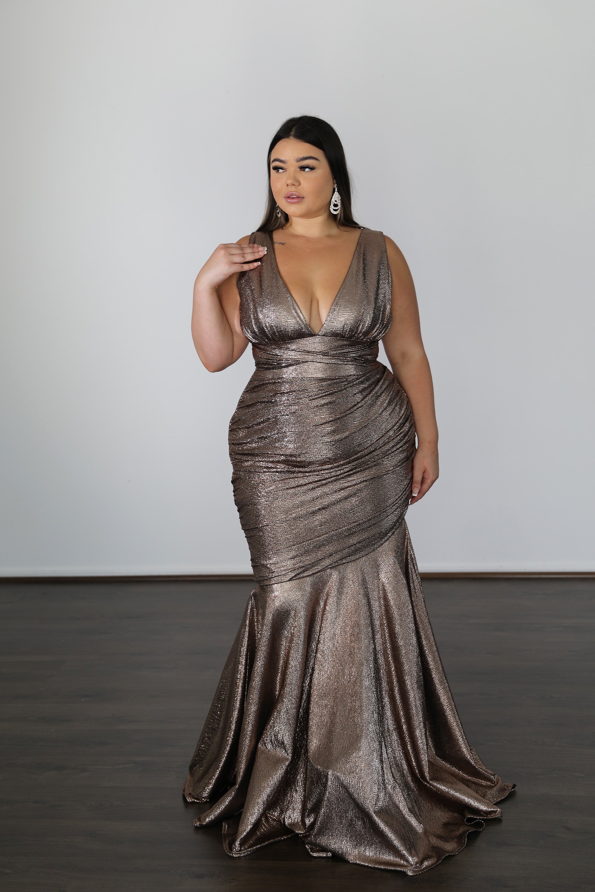 copper coloured fitted mermaid formal dress with v-neckline