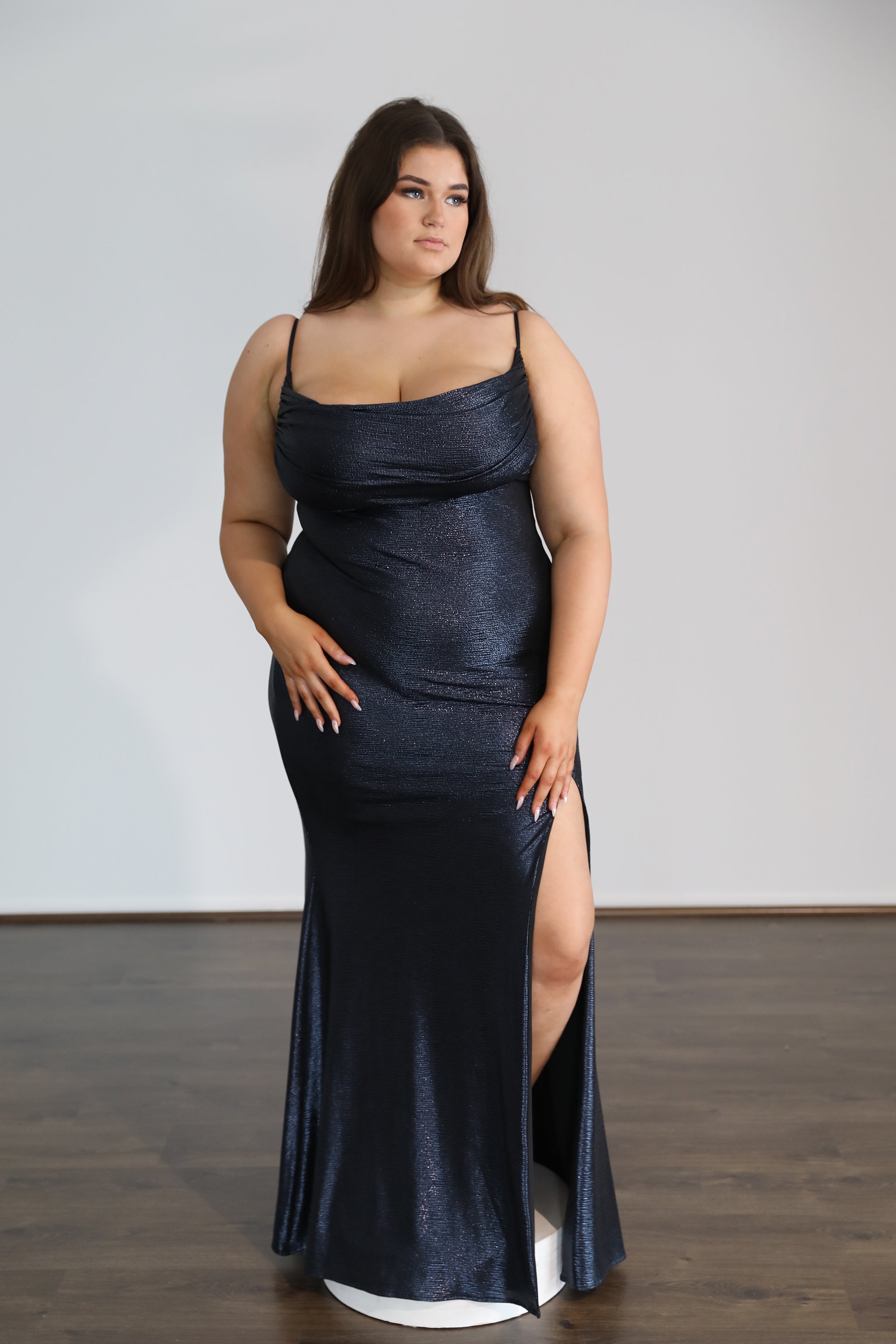 down neck navy formal dress on model