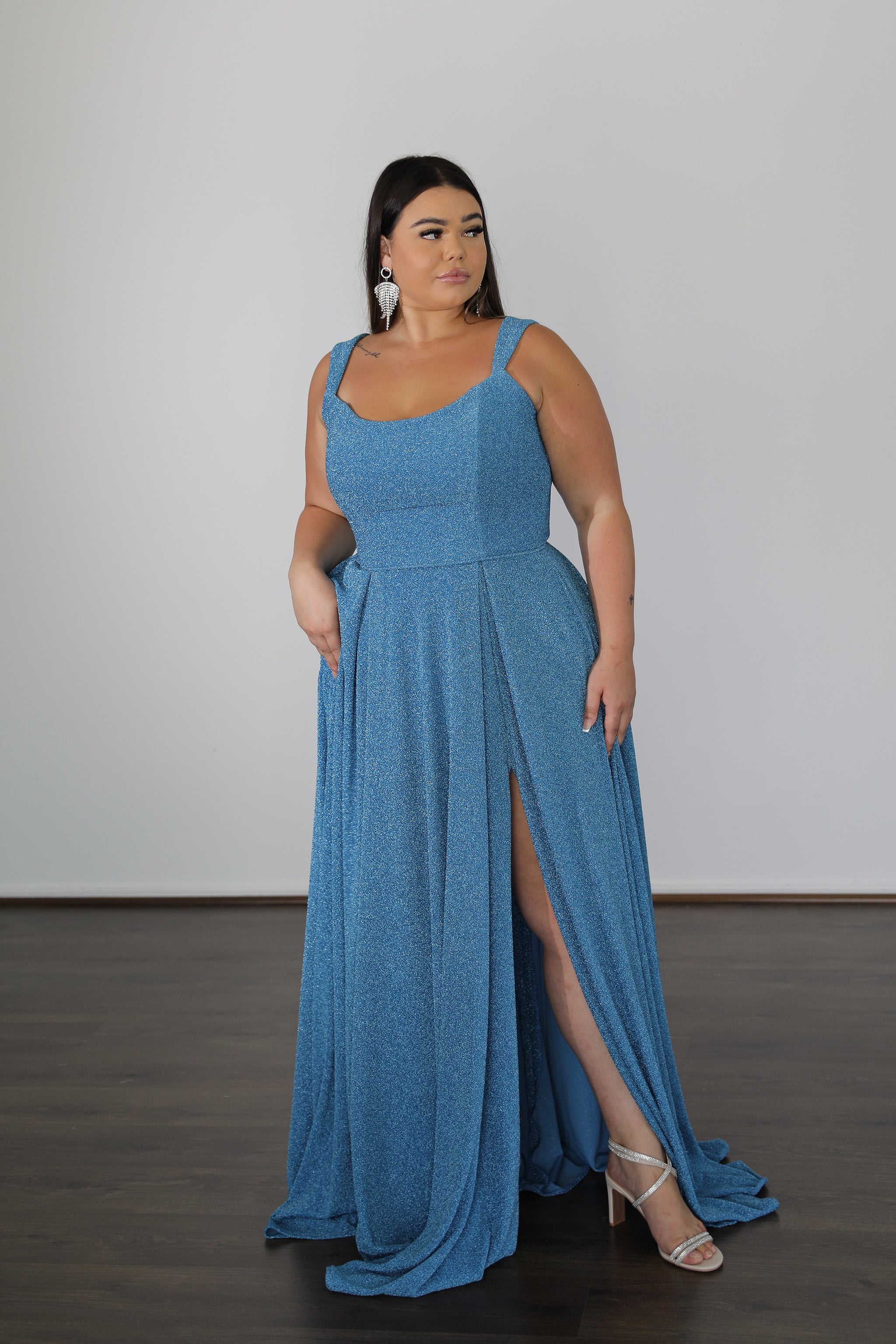 high split on blue formal dress with sweetheart neckline and flowing skirt