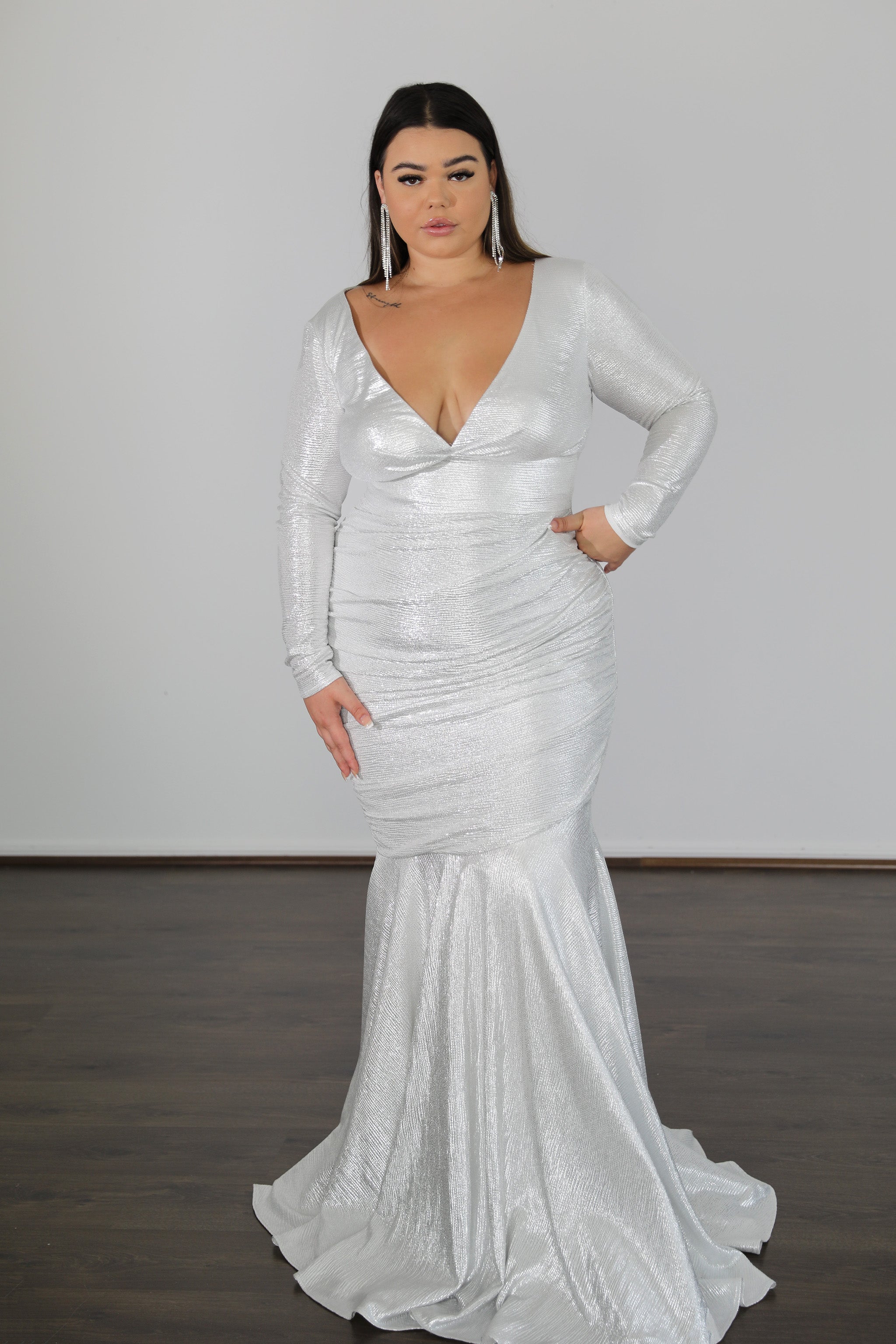 long sleeve silver formal dress with mermaid skirt